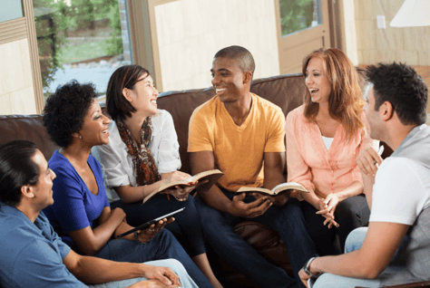 group of friends spending time together in a living room environment